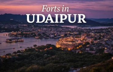 Udaipur sunset cityscape showing City Palace and famous forts in Udaipur.