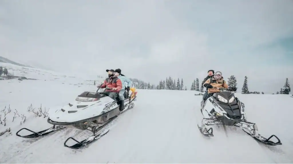 Snowmobiling adventure in Gulmarg during Jammu Kashmir tour package