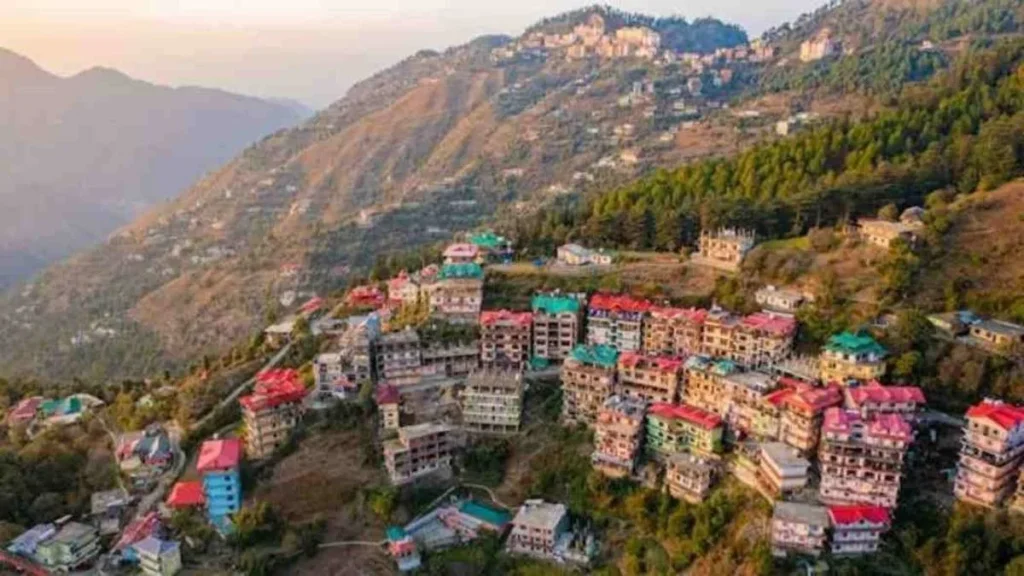 Scenic hillside view of Shimla with colorful houses and mountain landscape