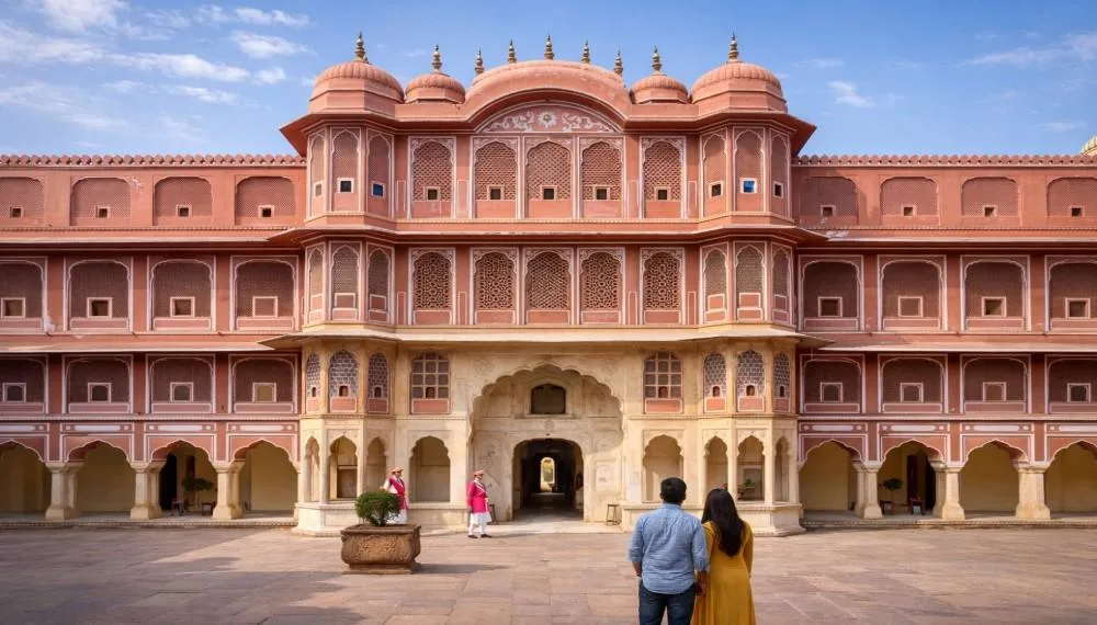 A beautiful view of the City Palace in Jaipur, Rajasthan, showing Rajput and Mughal style architecture, chhatris and carved windows