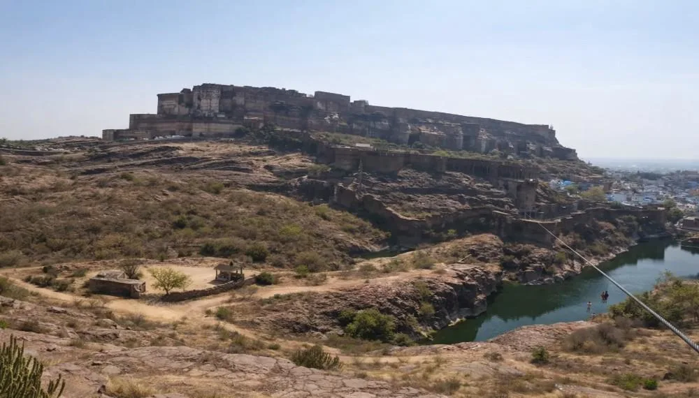 Adventure sports near Mehrangarh Fort showing zip line over water