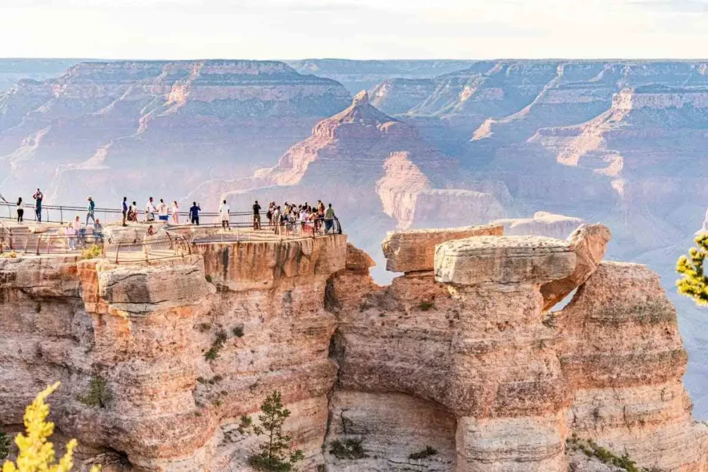 Tourists enjoying the Grand Canyon Arizona view
