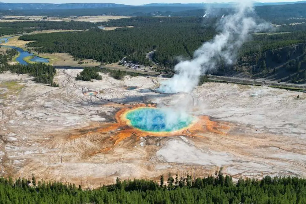 Colorful geyser view at Yellowstone National Park Wyoming featured in Best Places to Visit in July USA