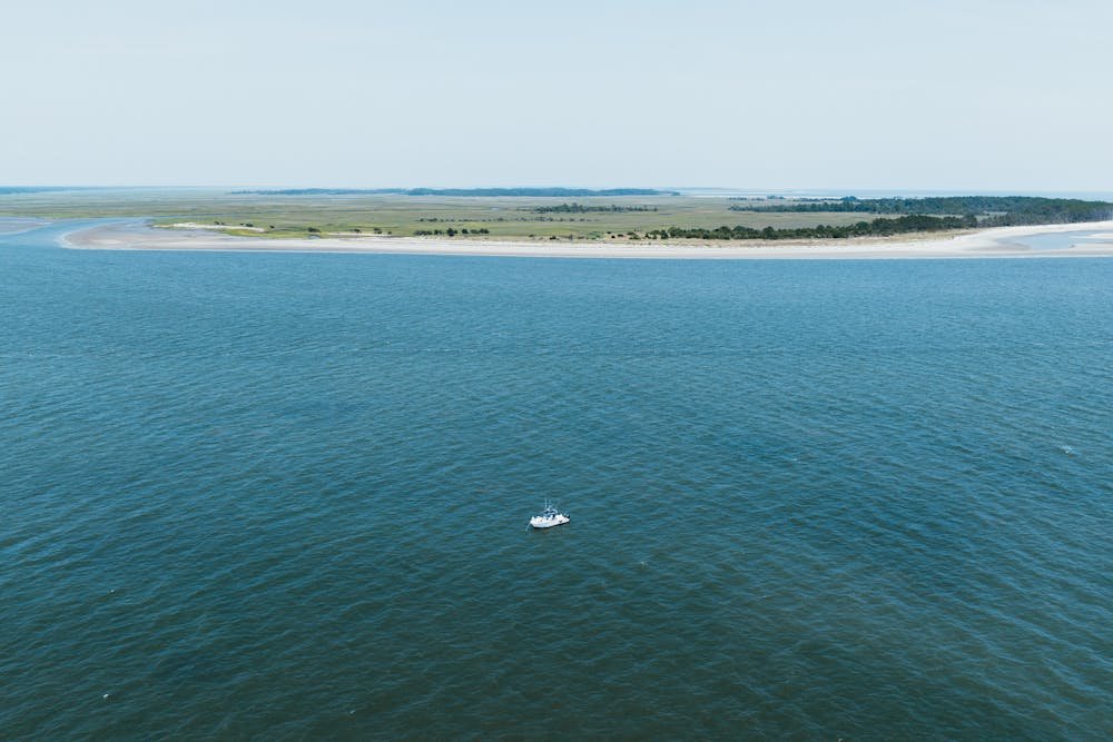 Aerial view of Cumberland Island's wild coastline and ocean, a beautiful destination among places to visit in Georgia USA.
