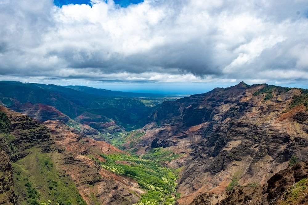 Stunning landscape view of Waimea Canyon on Kauai, one of the best islands to visit in september
