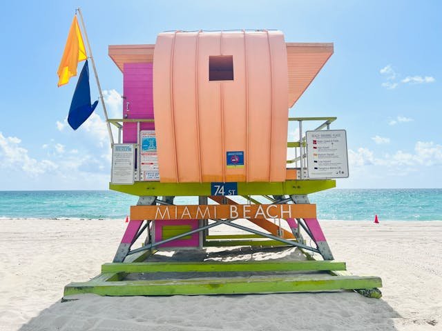 Colorful lifeguard tower on Miami Beach known for the best beach vacations in the us