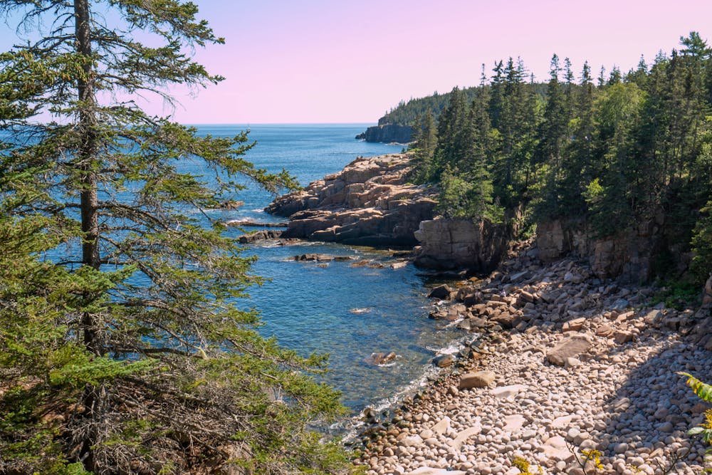 Stunning Acadia National Park coastline view, featured in best places to visit in august in usa.